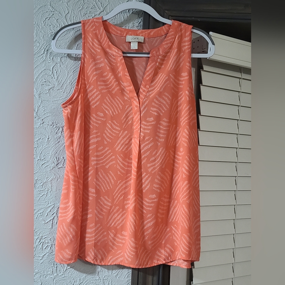 LOFT Ladies Sleeveless Tank Top in apricot orange with a white abstract pattern